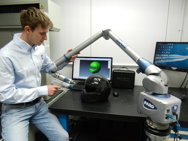 3D laser scanning service being performed on a motorsports helmet